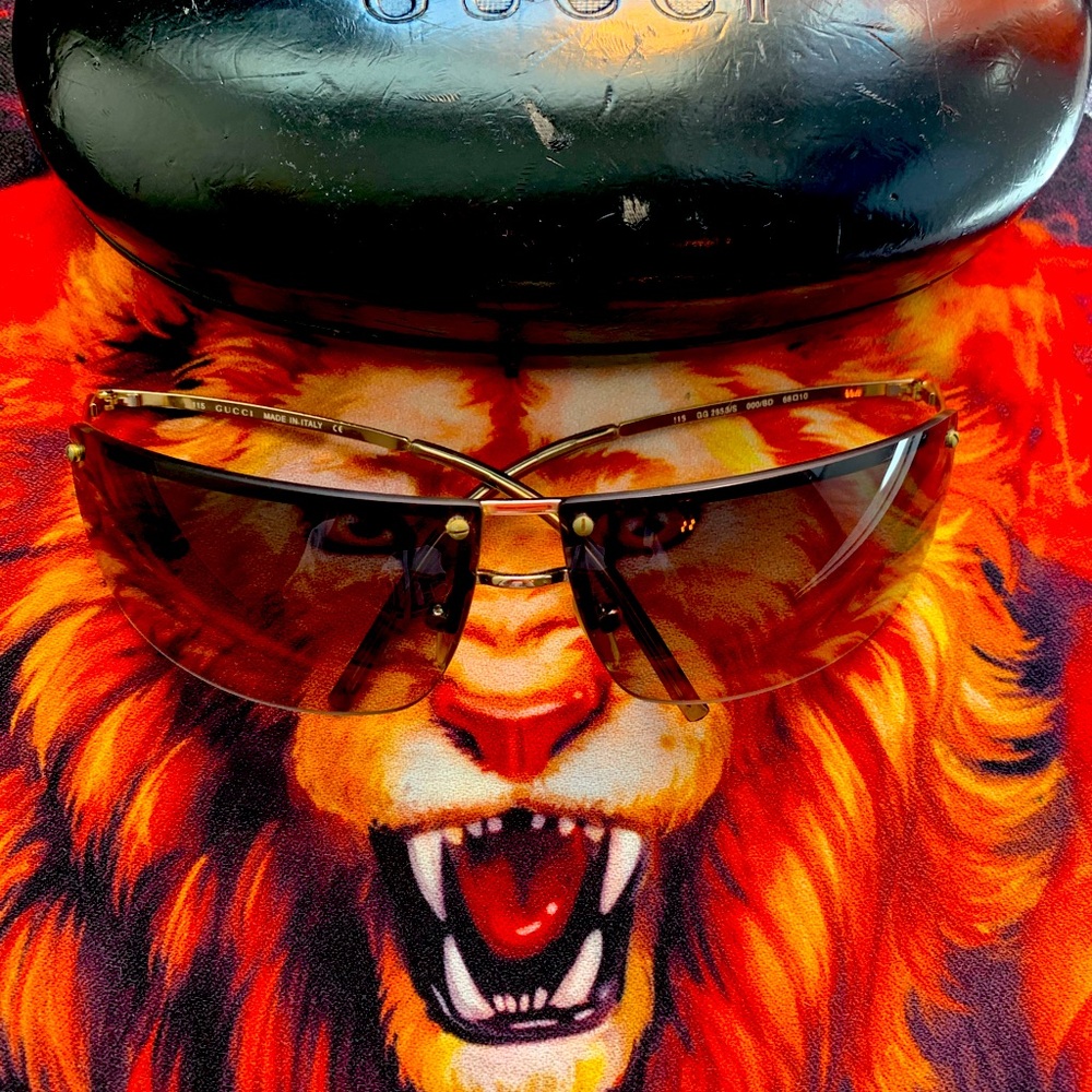 Gucci glasses 115
